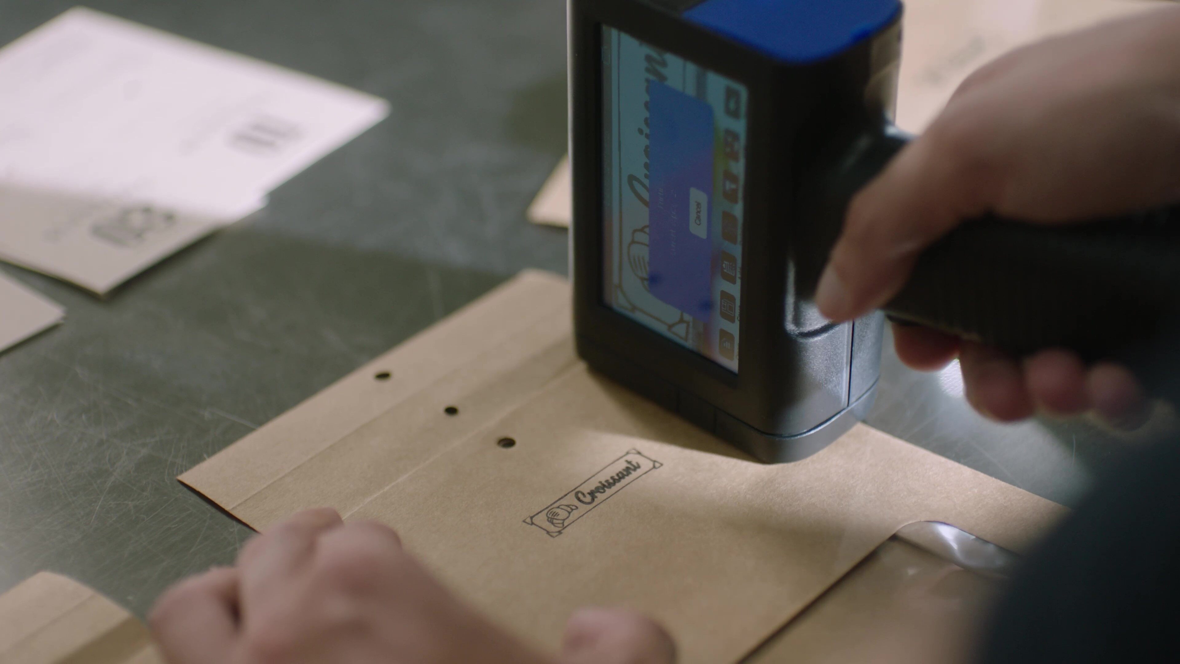 Warehouse_worker_scanning_a_large_format_inventory_QR_code_on_a_pallet_for_real_time_supply_chain_tracking