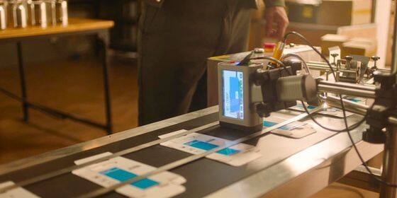 bentsai 6205BL handheld printer on conveyor line